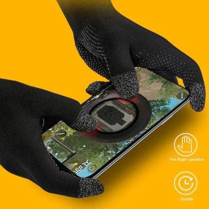 Black gloves with touchscreen tips holding a smartphone on a yellow background
