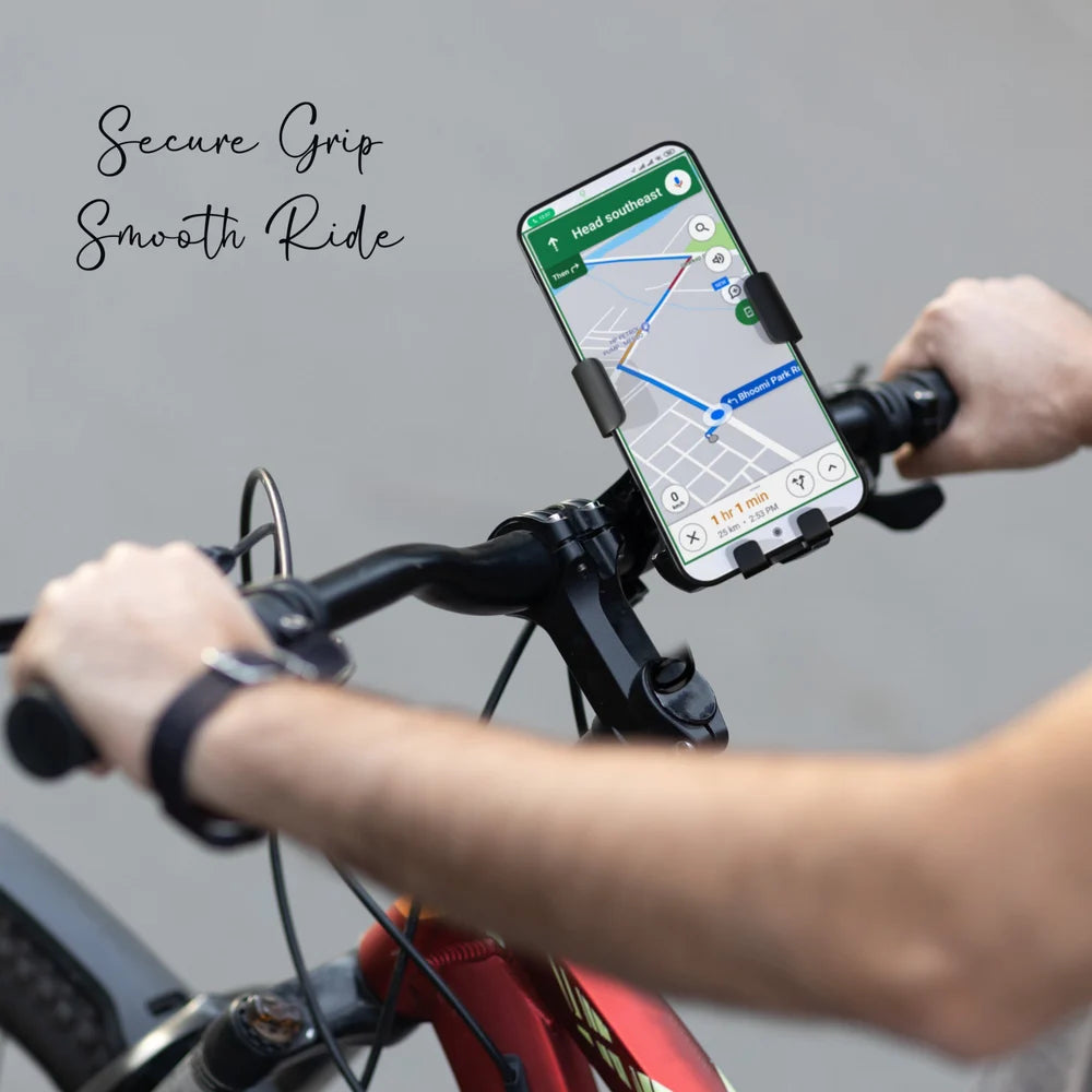 Phone mounted on a Mobile Holder for Bike with navigation app displayed, text 'Secure Grip Smooth Ride' above.