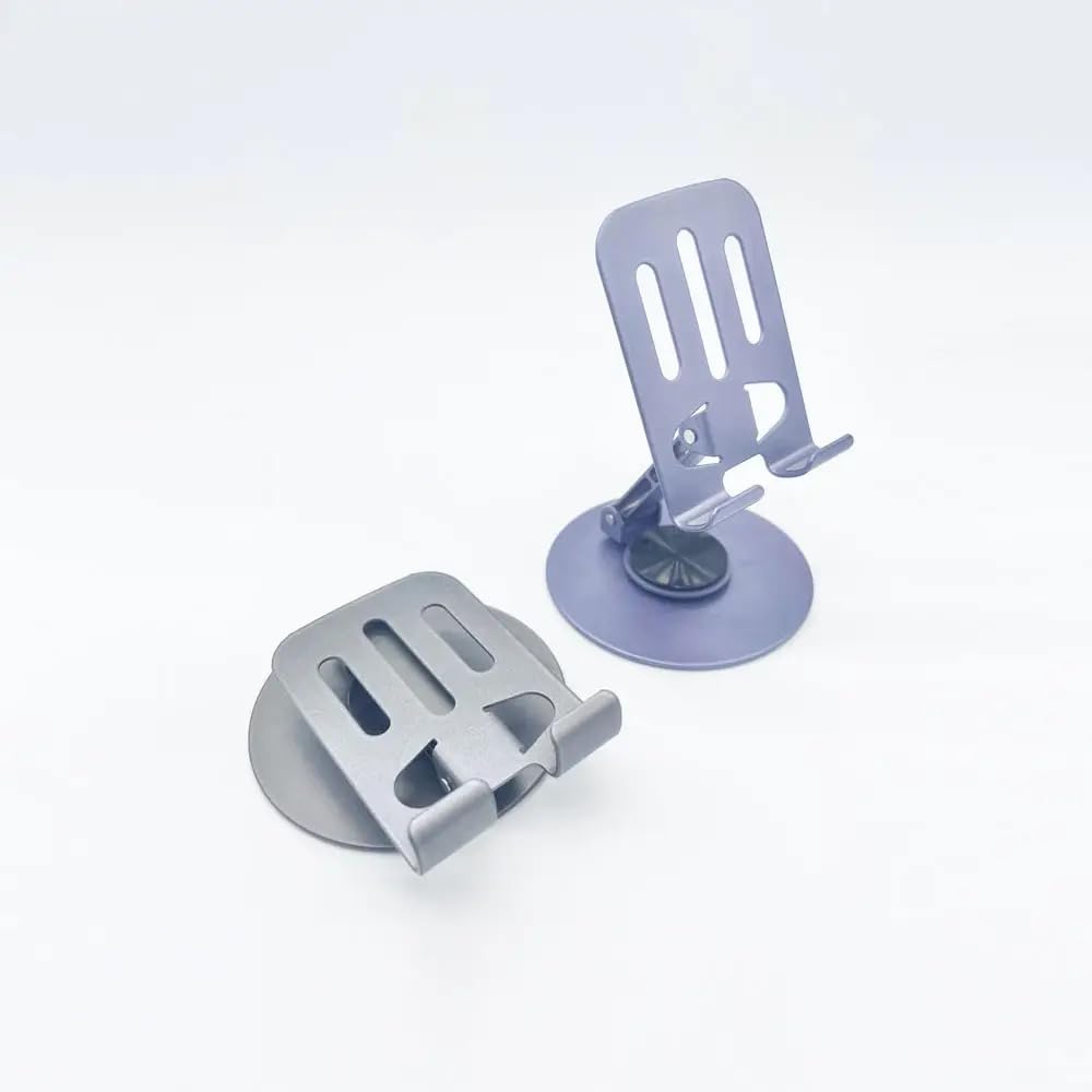 Two gray suction cup holders on a white background
